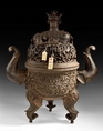 A MASSIVE BRONZE TRIPOD CENSER AND COVER