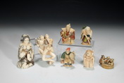 A GROUP OF SEVEN JAPANESE IVORY NETSUKE