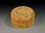 A DELICATELY CARVED IVORY STAMP PASTE BOX