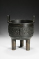 A PATINATED BRONZE CENSER