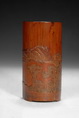 A WELL CARVED BAMBOO BRUSH POT