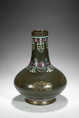 AN UNUSUAL FAMILLE ROSE, GILT AND SILVER-DECORATED TEADUST-GLAZED BOTTLE VASE