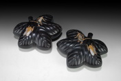 A PAIR OF CARVED ZITAN COVERED BOXES IN THE FORM OF MAPLE LEAVES