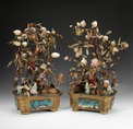 A PAIR OF JADE AND HARDSTONE TREES IN GILT-METAL ENAMEL JARDINIERES