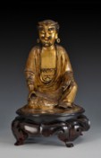 A GILT BRONZE ARHAT STATUE