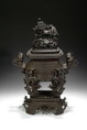 A BRONZE CENSER SET IN BAMBOO FORM