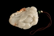 A WHITE JADE CARVED ZHONG KUI ORNAMENT