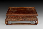 A CARVED HUANGHUALI STAND