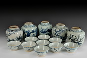 A MING PROVINCIAL KILN UNDERGLAZED BLUE AND WHITE BOWLS AND FLASKS