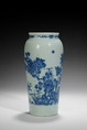 AN UNDERGLAZE BLUE AND WHITE BALUSTER VASE