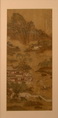 A FRAMED SILK PAINTING OF MOUNTAIN RANGE OF PAVILLIONS AND HUMAN FIGURES