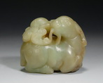 A CELADON JADE CARVING OF A RAM