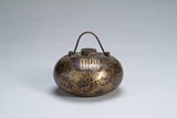 A Chinese bronze hand warmer