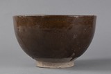 A brown glazed bowl