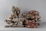 A group of five wood carvings