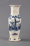 A blue and white hexagonal vase