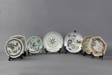A set of seven porcelain plates