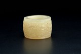 A Chinese jade thumb ring