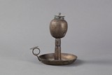 A bronze oil lamp