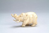 A Chinese carved ivory elephant