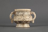A carved ivory censer