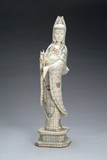 A Chinese bone carved Guan Yin figure