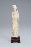 A Chinese carved ivory lady musician figure