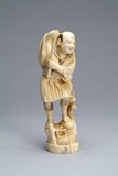 A Japanese ivory carved fisherman