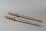 A pair of bronze ceremonial clubs
