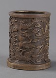 A Chinese carved crane brush-pot