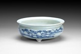 A CHINESE BLUE AND WHITE TRIPOD CENSER