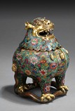 A CLOISONNE ENAMELED 'MYTHICAL BEAST' LIDDED JAR