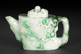 A CARVED JADEITE 'LONGEVITY PEACH' TEAPOT