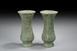 A PAIR OF ARCHAIC BRONZE 'PHOENIX' BOTTLES