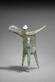 A BRONZE RITUAL TRIPOD WINE VESSEL 