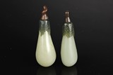 A PAIR OF JADE CARVED EGGPLANT SHAPED SNUFF BOTTLE