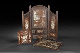 TWO DECORATED WOOD TABLE SCREENS AND ONE DECORATED WOOD TRAY