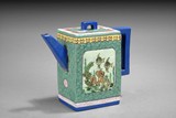 A PAINTED ZISHA STONEWARE TEAPOT