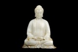 A RARE LARGE HETIAN WHITE JADE CARVED SHAKYAMUNI SEATED FIGURE
