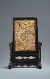 A SHOUSHAN SOAPSTONE PLAQUE INSET WITH ZITAN FRAMES