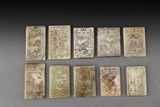 A SET OF TEN CARVED JADE RECTANGULAR PENDANTS