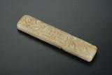 A CHINESE CARVED JADE PAPERWEIGHT