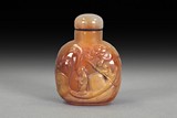A CARVED AGATE SNUFF BOTTLE 