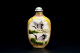 A CHINESE ENAMELED METAL SNUFF BOTTLE
