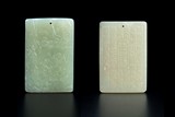 TWO CHINESE CARVED JADE RECTANGULAR PENDANTS