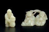 TWO CHINESE CARVED JADE ORNAMENTS