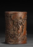 A CARVED HARDWOOD BRUSH POT