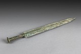 AN ARCHAIC BRONZE SWORD