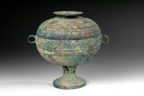 AN ARCHAIC BRONZE LIDDED ZUN VESSEL