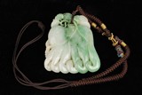 A JADEITE 'BUDDHA'S HAND' ORNAMENT CARVING